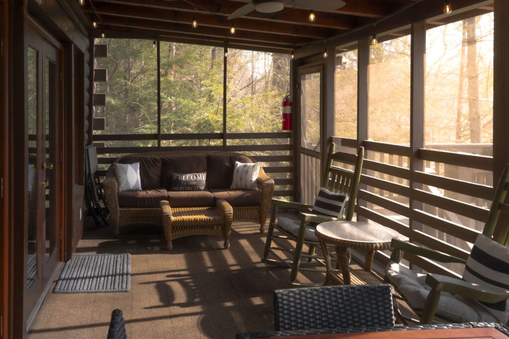 Sunroom of the Lincoln Logs Cabin with plenty of seating and sunlight